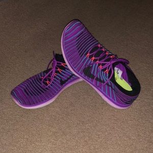 Nike free run, fly knit. Size 7.5. Neon purple with hints of blue and coral